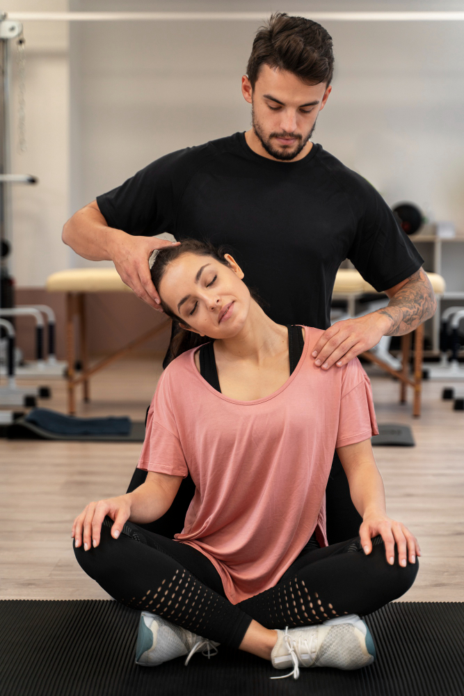 medium shot physiotherapist helping woman